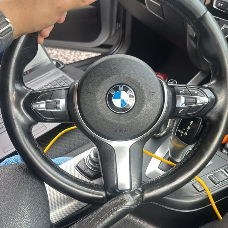 The M Sport steering wheel with paddle shifters retrofitted to a BMW F20 120d